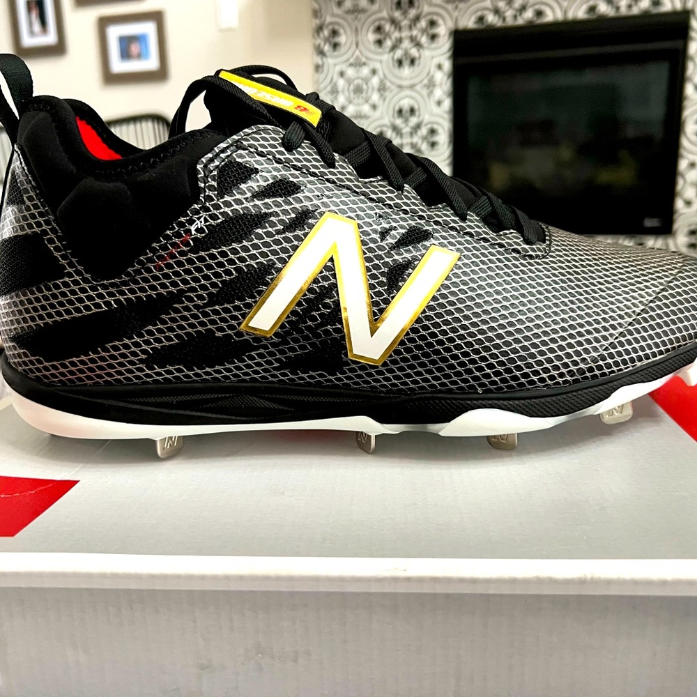 Brand new New Balance metal spikes.